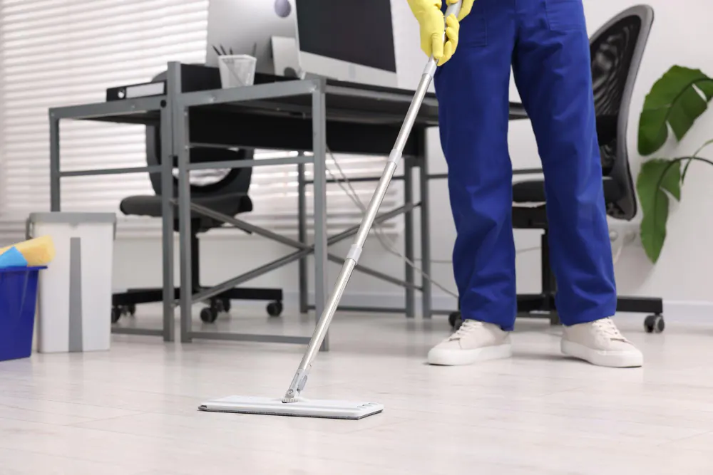 Mopping the floor between office desks